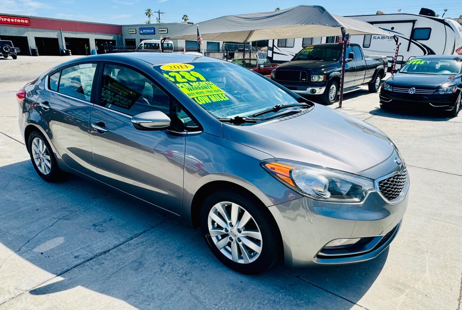 2014 grey Kia Forte (KNAFX4A86E5) , located at 2190 Hwy 95, Bullhead City, AZ, 86442, (928) 704-0060, 0.000000, 0.000000 - 2014 Kia Forte EX. 2.0 4 cylinder engine. great gas mileage. new engine with warranty. great gas mileage. brand new tires. financing available. super clean. bluetooth, backup sensors. keyless entry. satellite radio. buy here pay here. in house financing . we finance. only at Dunton Motors. - Photo#5